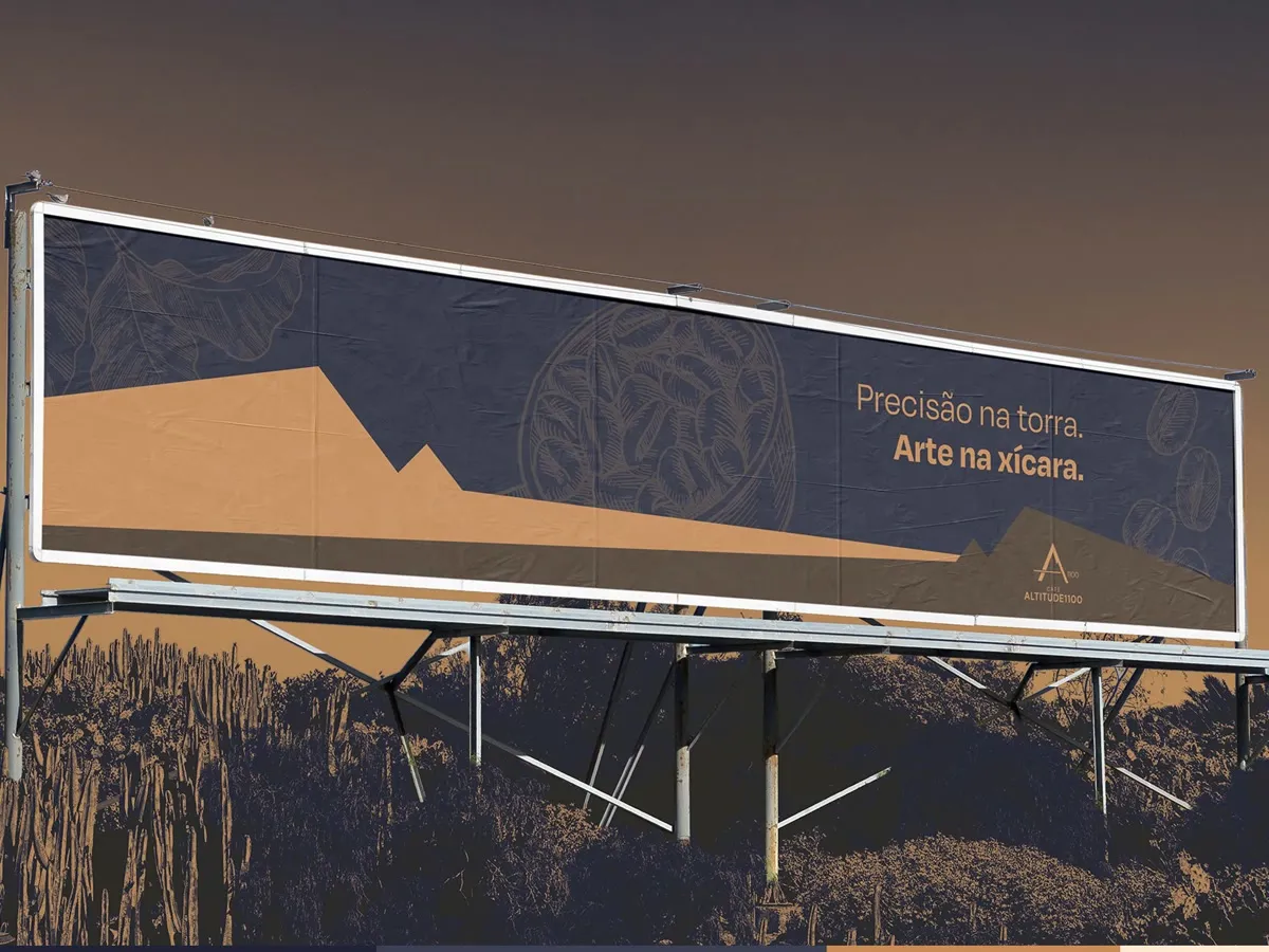 Outdoor da marca em um campo, com a frase Precisão na terra. Arte na xícara.